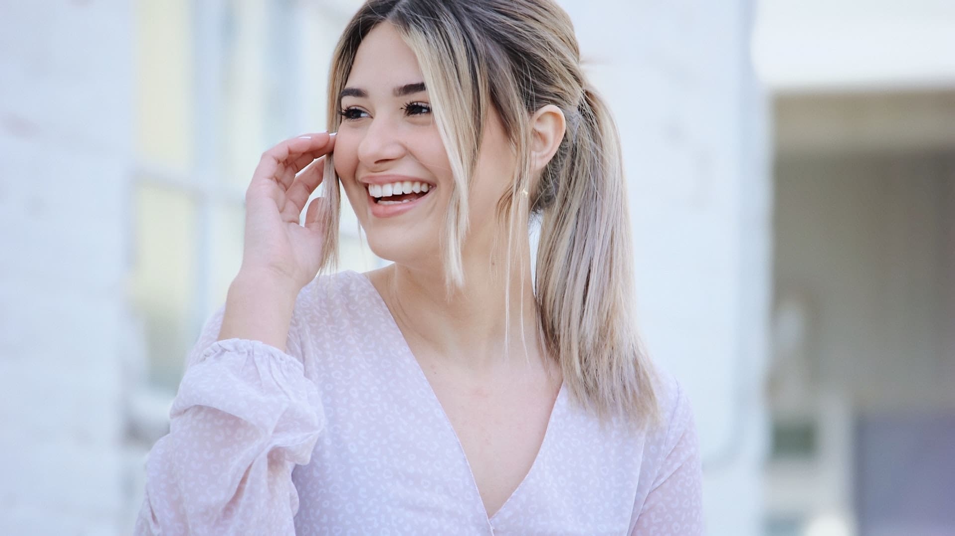 woman smiling and looking away