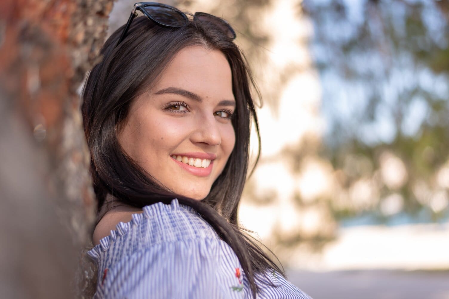 woman smiling because of cosmestic dentistry