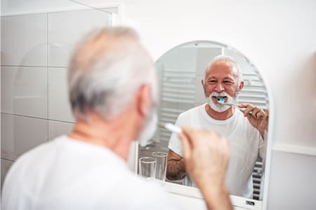 You can resume your regular oral hygiene routine a day after dental implant surgery