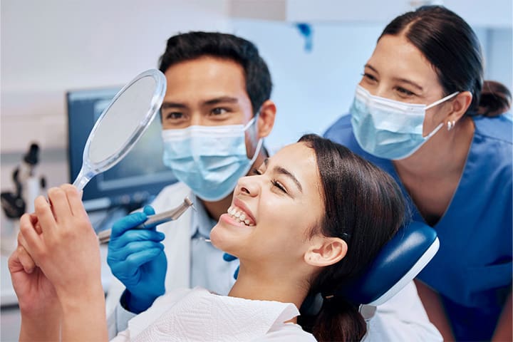 Patient in Weston talking to dentist about a smile makeover